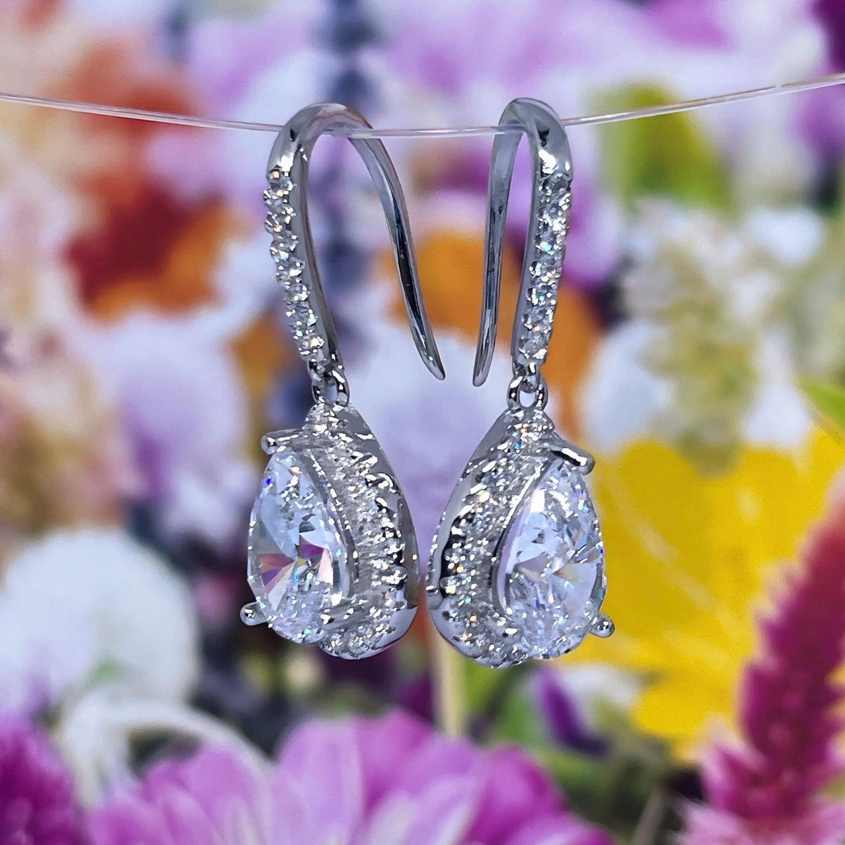 Pear Cut 2 Ct Moissanite Dangle Earrings: 925 Sterling Silver