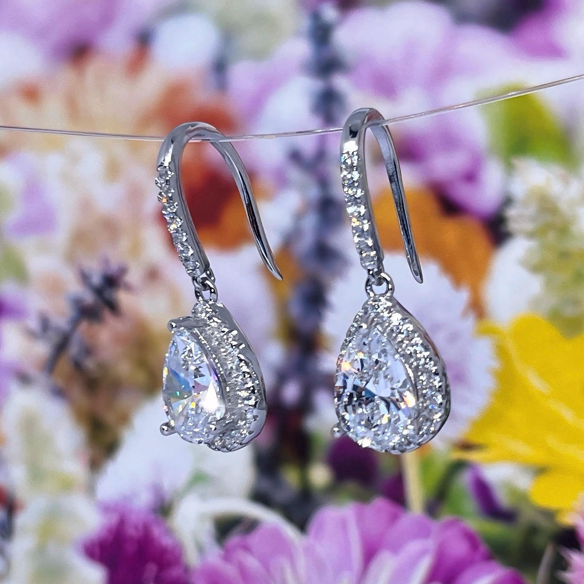 Pear Cut 2 Ct Moissanite Dangle Earrings: 925 Sterling Silver