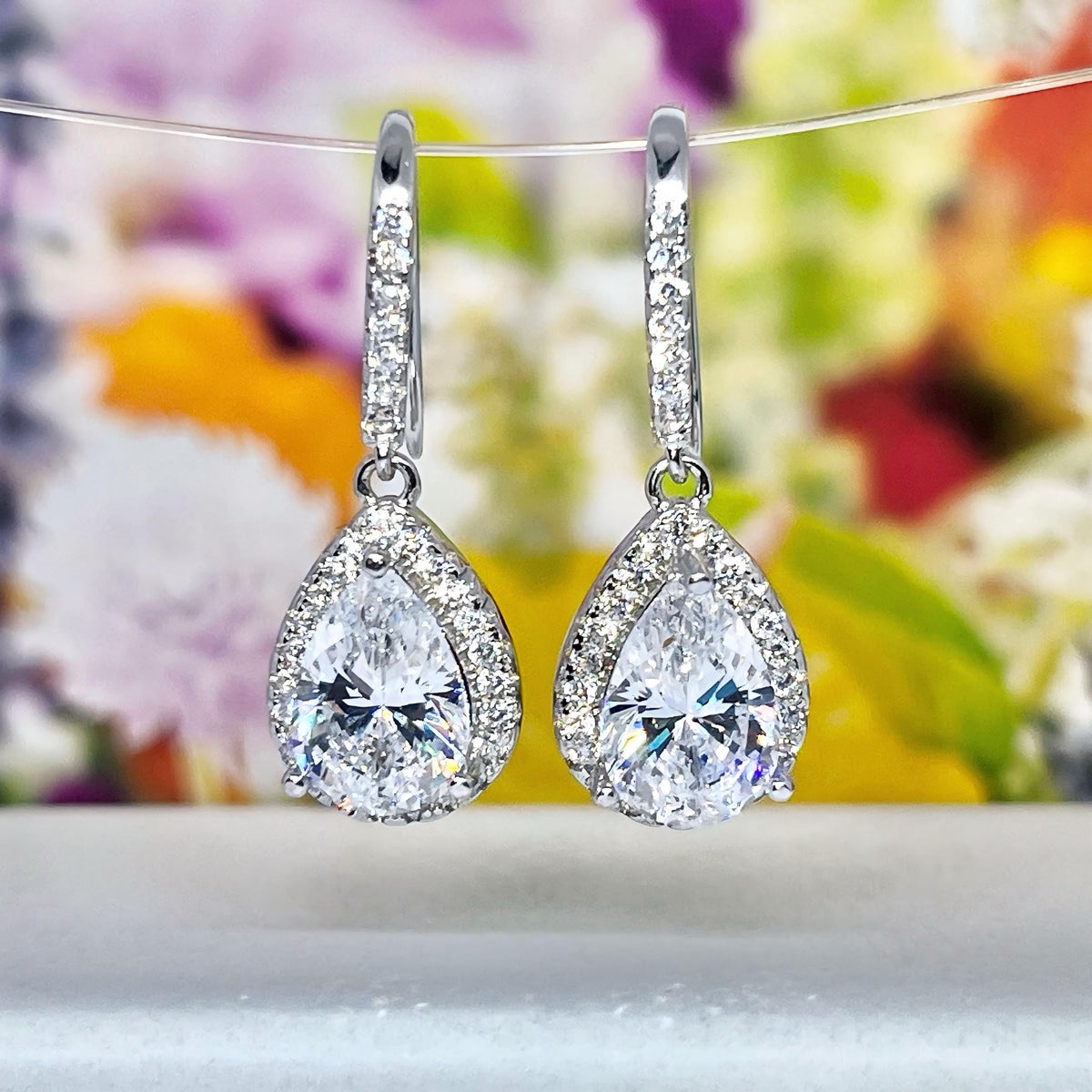 Pear Cut 2 Ct Moissanite Dangle Earrings: 925 Sterling Silver