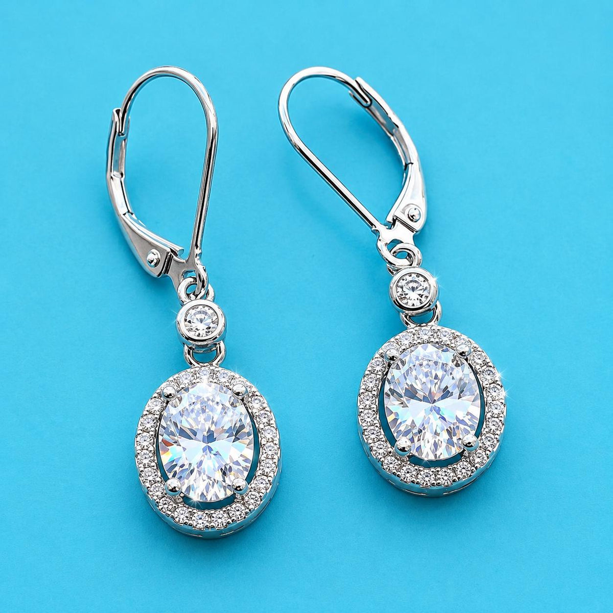 Oval Cut 1.5 Ct Moissanite Dangle Earrings: 925 Sterling Silver