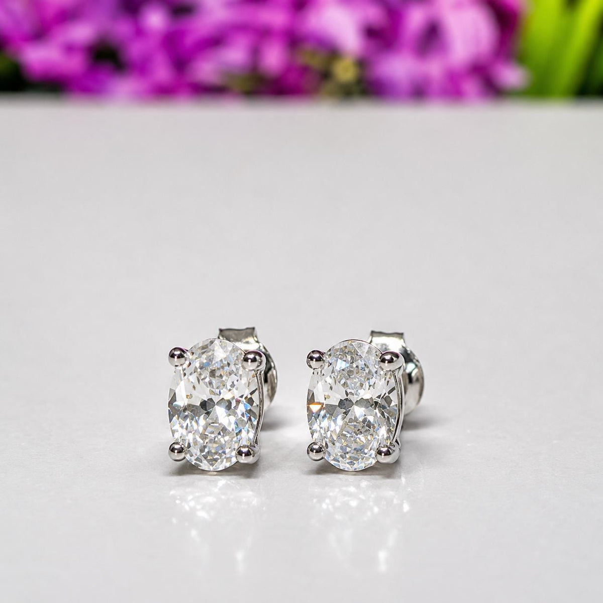 Oval Cut 1 Ct Moissanite Diamond Stud Earrings: Sterling Silver