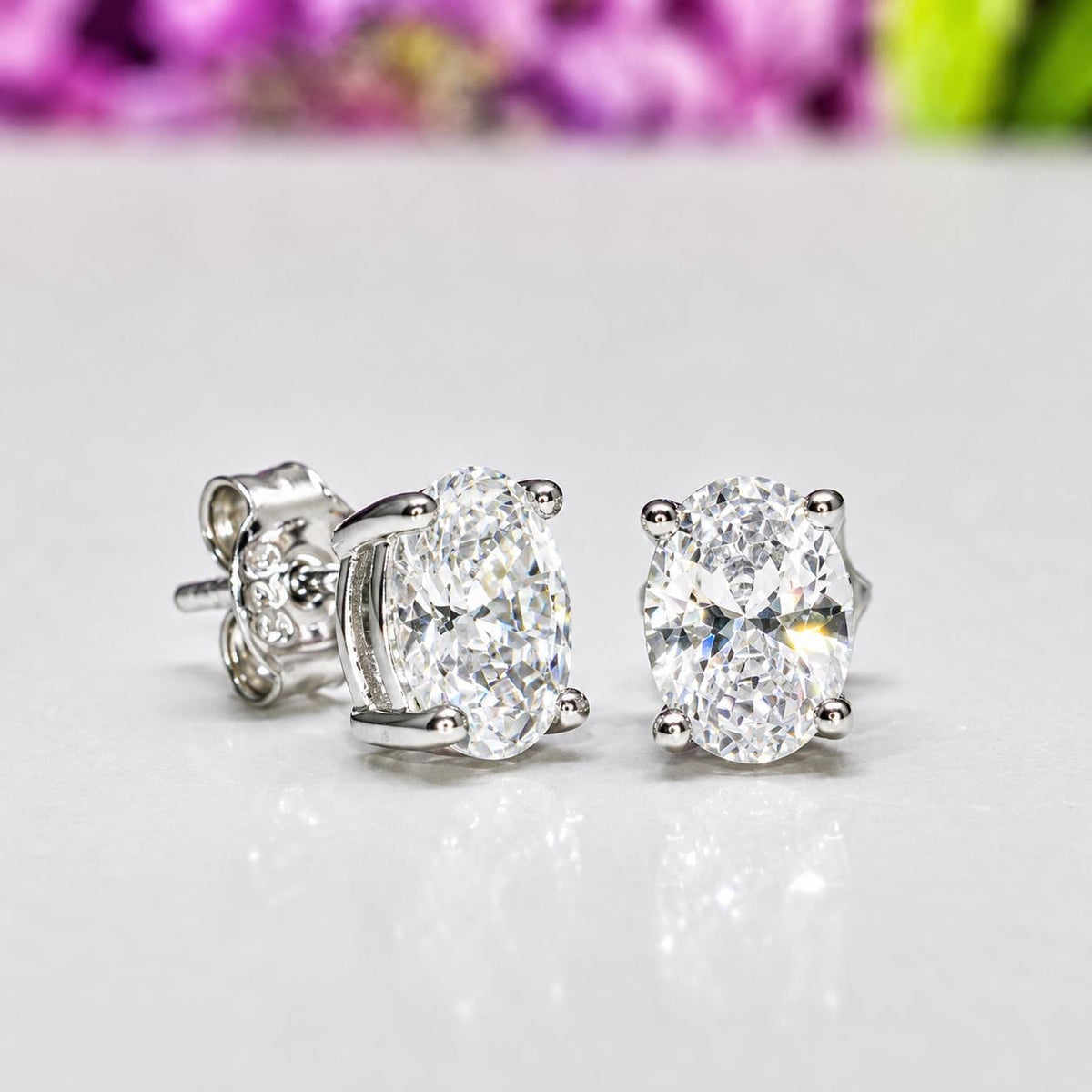 Oval Cut 1 Ct Moissanite Diamond Stud Earrings: Sterling Silver